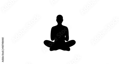 A silhouette of a person meditating in a seated position, creating a sense of inner peace and serenity.