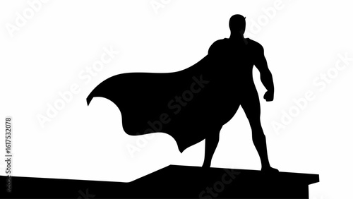 Silhouette of a superhero standing on a ledge with cape blowing in the wind against white background