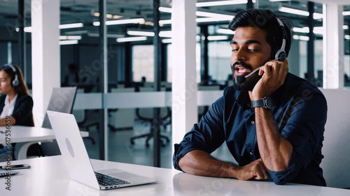 indian Professional conversation in modern office setting with animated discussion