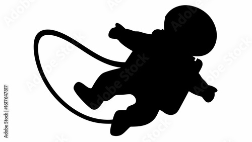 Silhouette of astronaut floating in space attached to a tether line pointing with his right hand up high