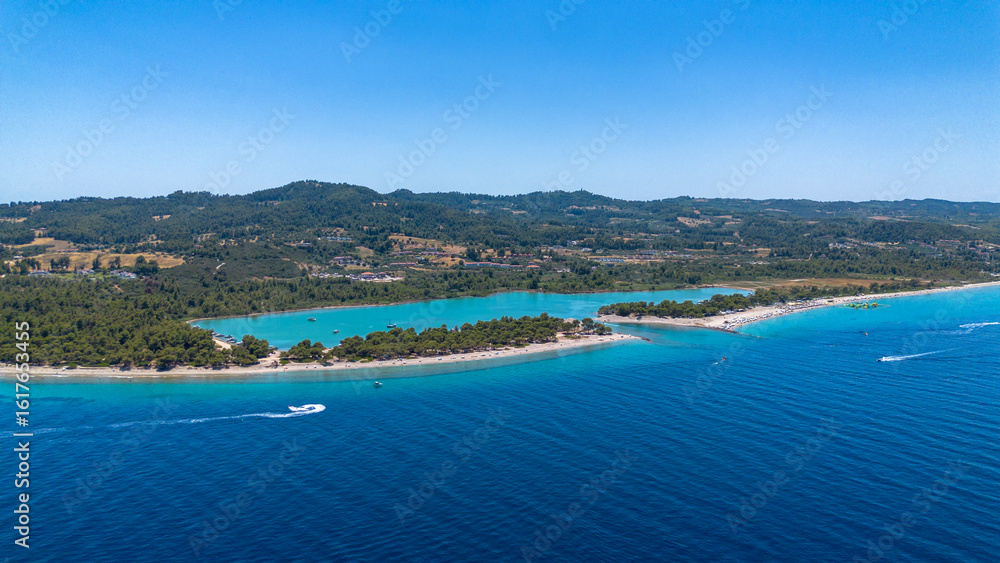 Fototapeta premium Drone aerial view of Port Glarokavos and Lagoon Beach in the Kassandra Peninsula, Halkidiki region, Greece