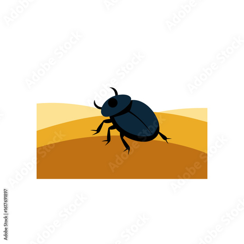 scarab beetle crawling over golden sand