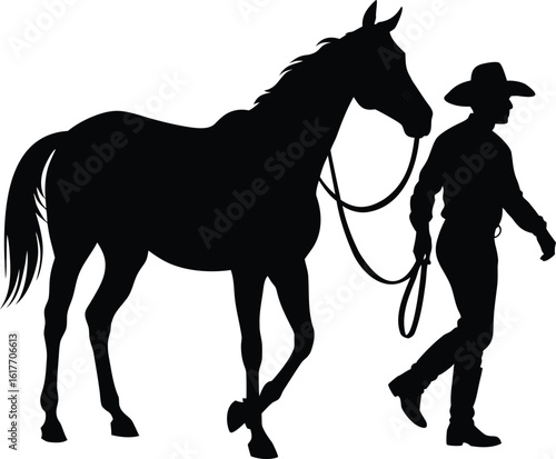 Black silhouette of a cowboy leading a horse
