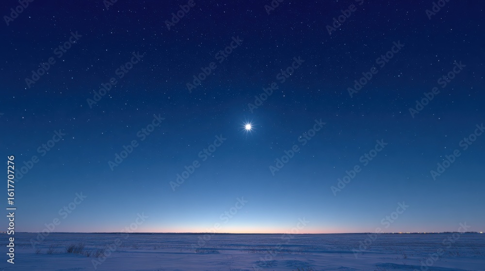 Fototapeta premium Serene winter night landscape with a glowing moon above a snowy field under a clear starry sky perfect for peaceful seasonal backgrounds, astronomy visuals and nature themes