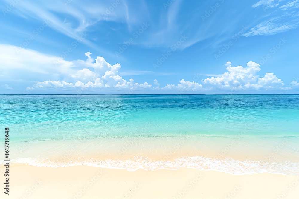 Fototapeta premium Sandy Beach Under Bright Blue Sky with Gentle Waves