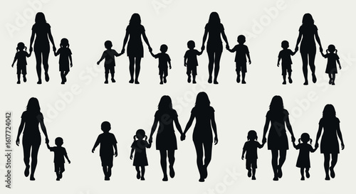Silhouettes of mothers and children holding hands walking on a white isolated background in a pattern