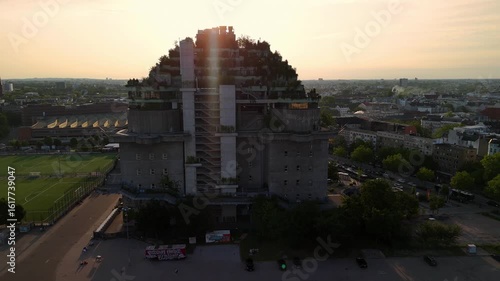 Aerial drone video of orbiting around the famous Bunker Building with newly greened roof in Hamburg