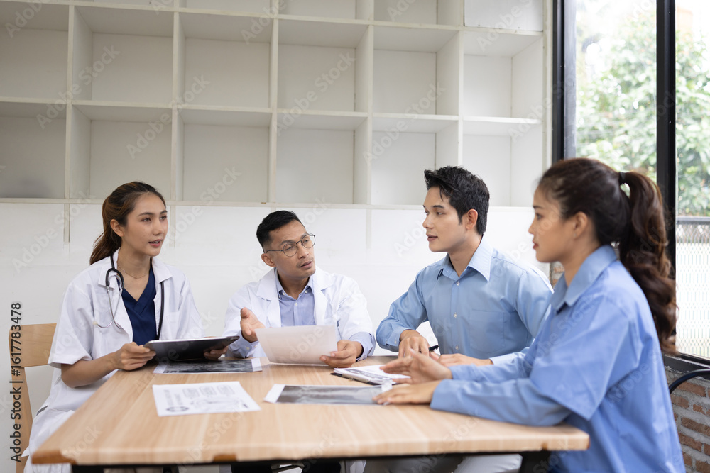 Medical team having a meeting in conference room at hospital, Medical technology and health care concept. Medical team having a meeting in conference room at hospital, Medical technology and health care concept.