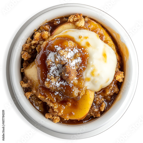Warm Apple Crumble Topped with Vanilla Ice Cream and Caramel Sauce