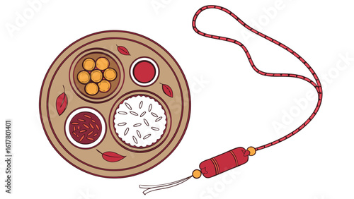 Traditional indian raksha bandhan thali with sweets rice and a decorative rakhi tied with a red thread