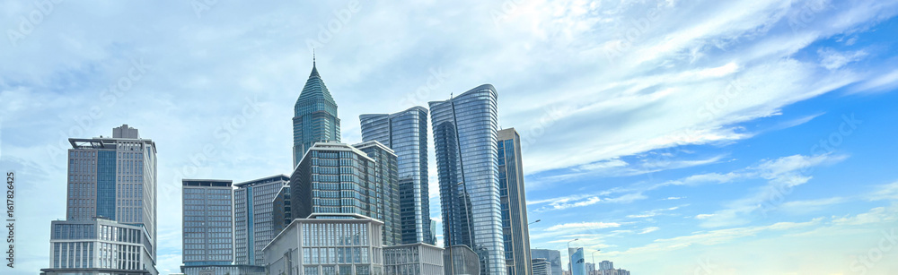 Obraz premium Panoramic View of a Modern City Financial District with Skyscrapers