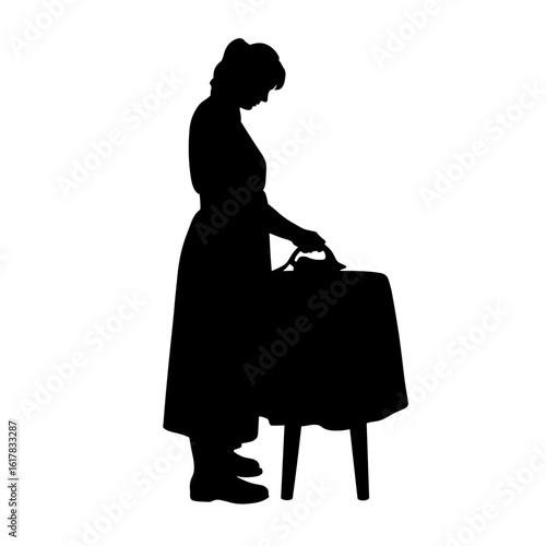 Silhouette of woman ironing clothes, a classic depiction of domestic life in vintage style. Silhouette of woman ironing captures timeless elegance, showing her focused on the task.