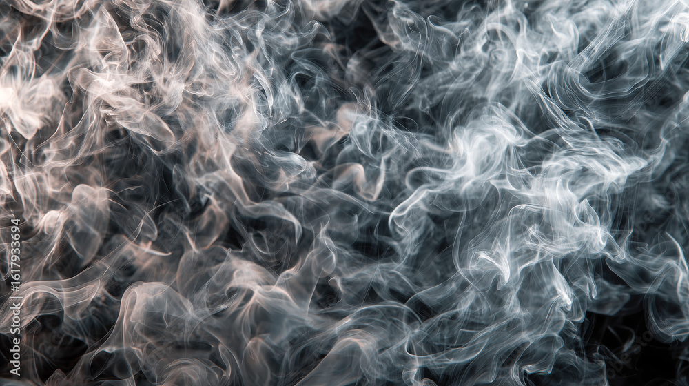 Fototapeta premium Intricate close-up of thick, swirling smoke clouds creating a detailed and mysterious abstract texture, perfect for use as a background or design element with a moody aesthetic.