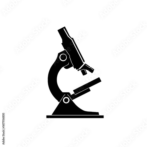 A black and white close-up of a microscope.