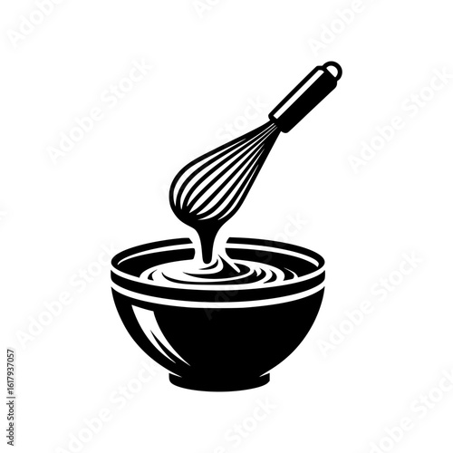Whisk mixing batter in a bowl with smooth texture