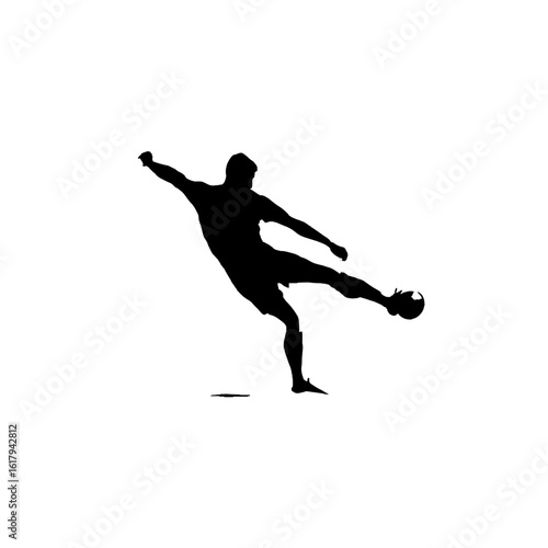 A silhouette of a soccer player kicking a soccer ball with strength and precision.