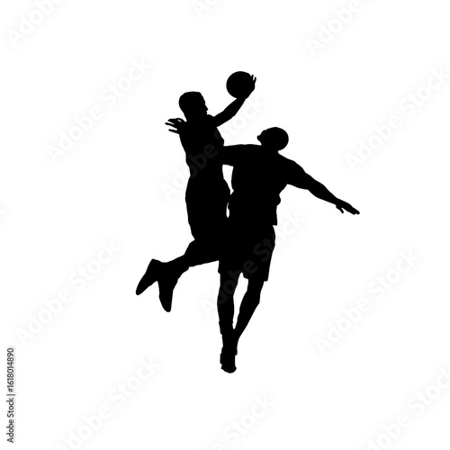 Silhouette of a basketball player in action.