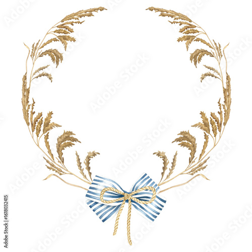 Fototapeta Semicircular frame of dried reeds with blue striped bow in the center
