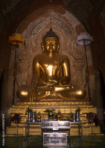 Golden buddha inside a temple, Bagan, Myanmar