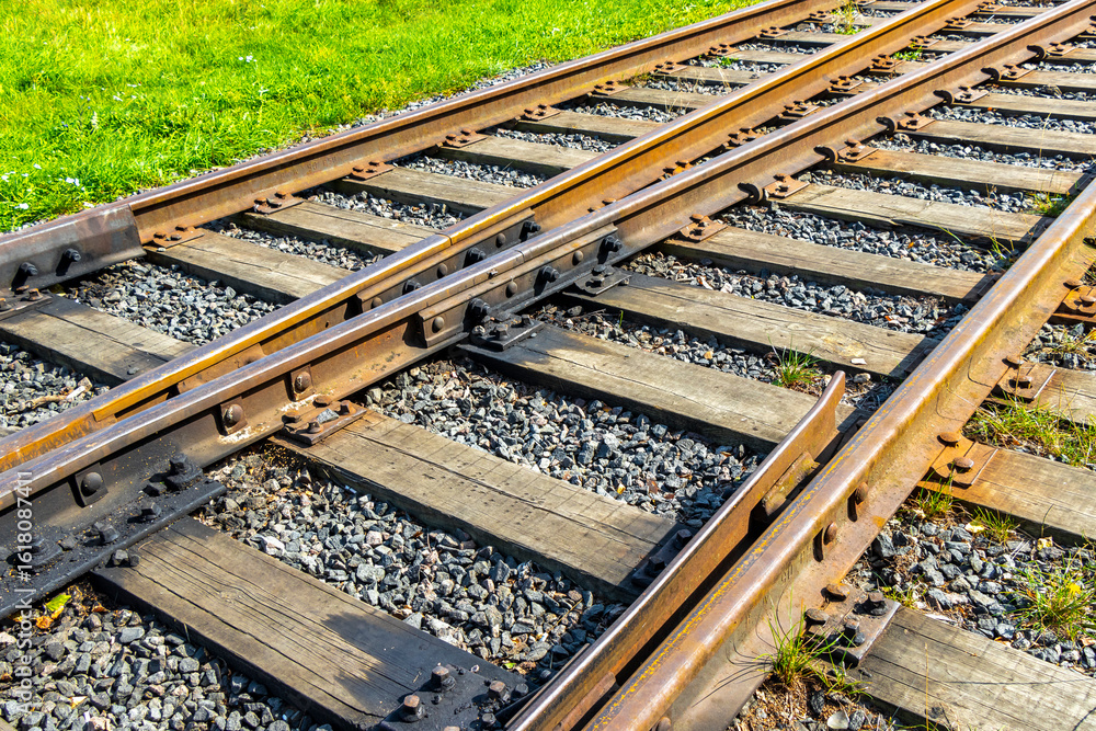 Naklejka premium Railway tracks railway crossing on village road in Brest Belarus.
