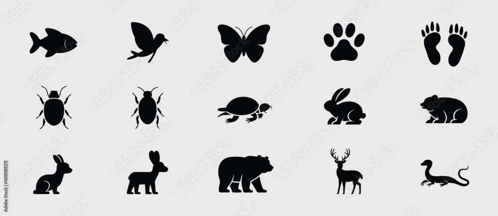 Fototapeta premium Collection of black animal silhouettes on a light gray background