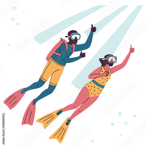 Two divers in snorkeling gear giving thumbs up with flippers and scuba tanks diving couple