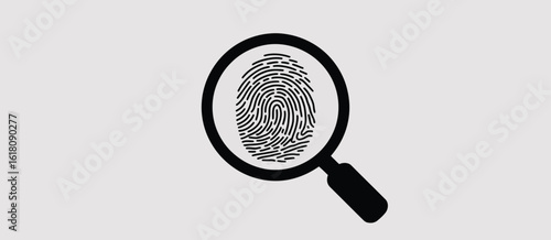 Magnifying glass over a detailed fingerprint for forensic investigation