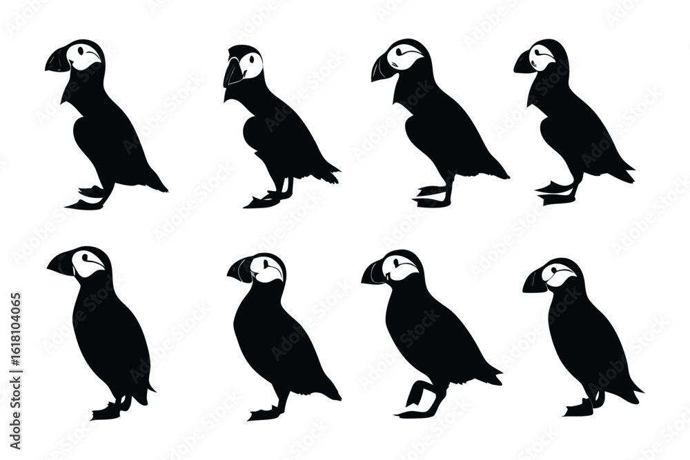 Obraz premium Puffin Silhouettes: A collection of stylized black silhouette illustrations of adorable puffins, perfect for conveying a sense of wildlife and natural beauty.
