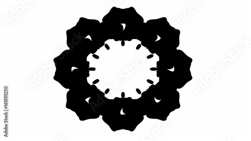 Abstract symmetrical black and white design resembling a flower with a central oval shaped void area silhouette
