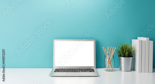 Modern workspace with laptop and minimal decor