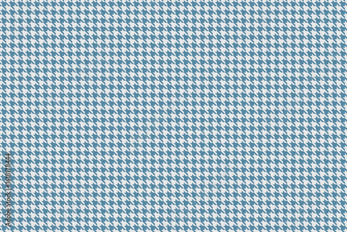 Classic blue and white houndstooth pattern.  Perfect for textile design, fashion,  website backgrounds, or print projects. This seamless texture offers a sophisticated and timeless aesthetic.