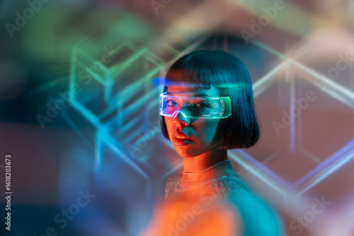 Latin woman exploring virtual reality with futuristic glasses