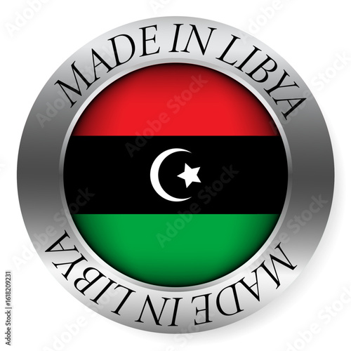 Made in Libya button icon. Circular emblem with metallic border, glossy central flag, and bilingual label indicating product origin and international manufacturing identity.