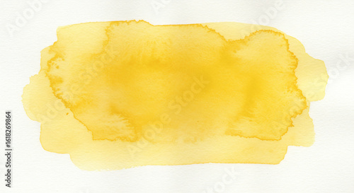 Watercolor yellow stain on white paper.