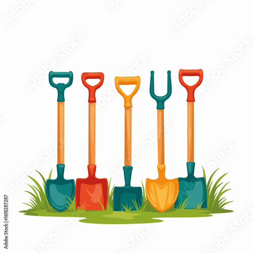 Colorful lawn tools lined up in grass with shovels and spades arranged for gardening. Lawn tools feature different styles: long handles and various blade shapes.