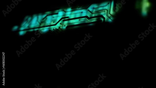 A video clip is projected onto an electronic circuit board, highlighting the tracks (trace) that connect the electronic components. Closeup. Macro