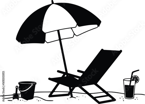 Silhouette of beach umbrella, chair, pail, shovel, and iced tea on sandy shore
