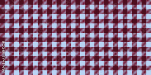 Seamless plaid pattern in burgundy, light blue colors. Gingham fabric texture background. Vintage checkered textile design.