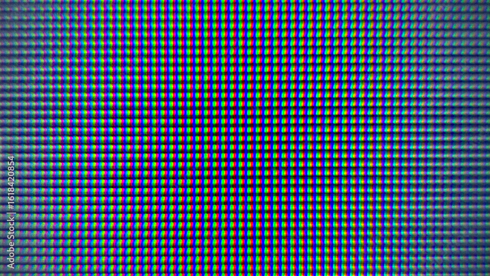 Fototapeta premium Close-up macro shot of an LCD screen showing individual pixels and RGB subpixels, a digital background.
