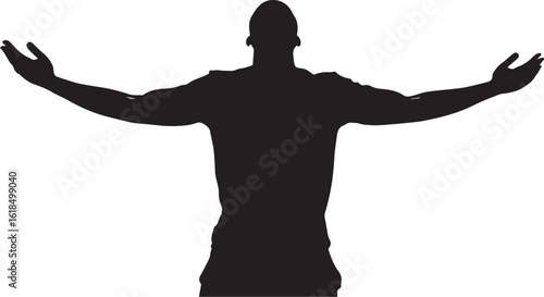 Silhouette of Jesus Christ statue standing with open arms against a light background
