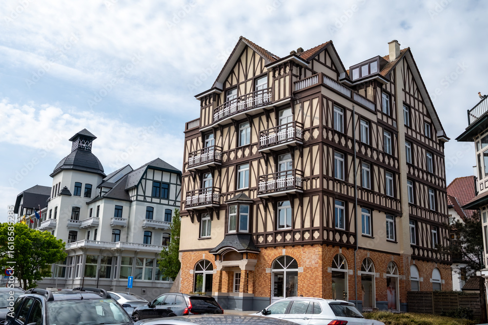 Fototapeta premium Cosy seaside holiday village on North Sea, built in belle epoque style in Flanders, De Haan or Le Coq sur Mer, Belgium