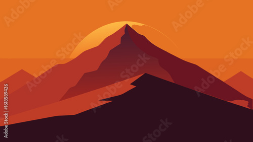 Witness the vast shadow of a mountain stretching across a valley creating a dramatic landscape