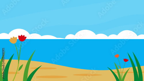 Picturesque grass flowers and a clear blue sky above a serene lake