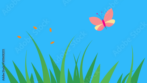 Charming grass flowers under a brilliant blue sky with a butterfly fluttering