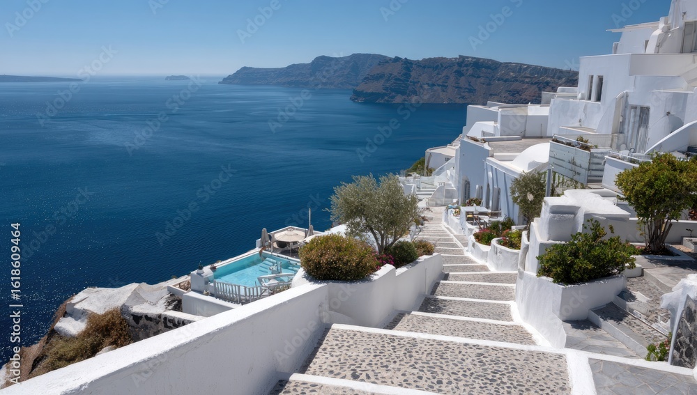 Fototapeta premium White cliffside resort overlooking Aegean Sea