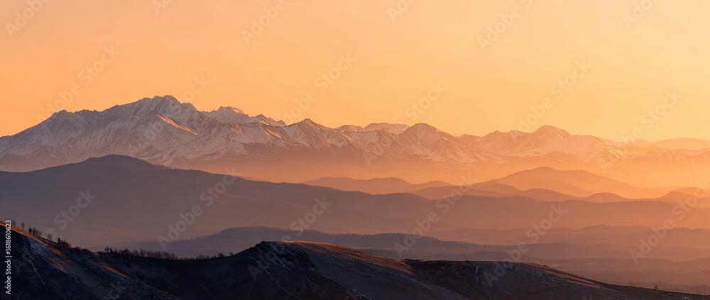 Naklejka premium Panoramic mountain range at sunrise (1)