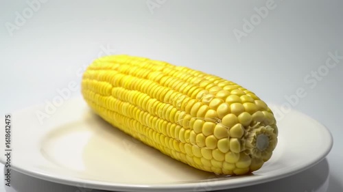 Yellow corn on a white plate