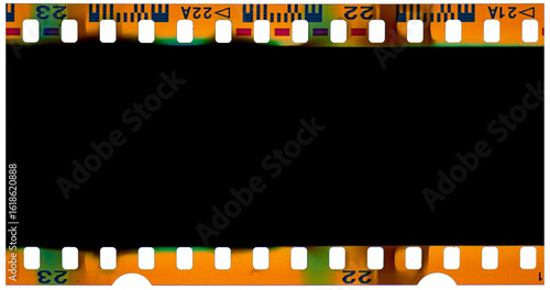 35 mm filmstrip with analog film burn effect, film noise texture and background, old film frame from analog retro film roll, photo texture with grain and scratches for vintage effect with damaged film