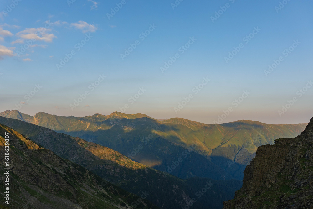 Fototapeta premium sunset over the mountains fagaras carpathians ridges mountain chain eastern europe