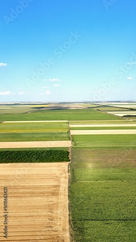 Drone photo of rural agricultural fields with cloud shadows, Vojvodina, Serbia